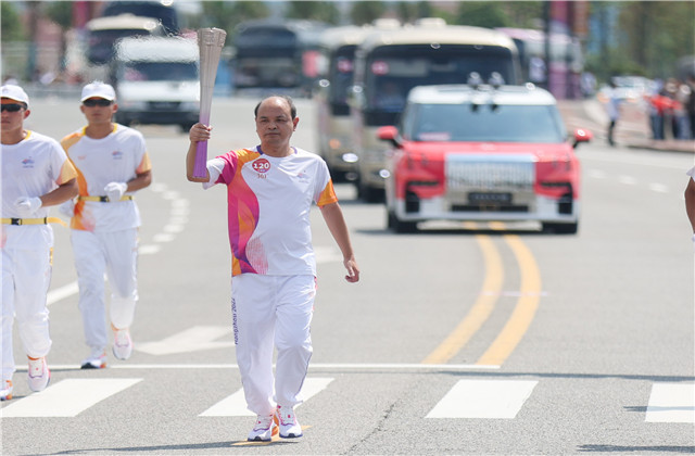 亞運火炬手韋曉青 ：參與“大蓮花”建設  ，傳遞火炬一生難忘